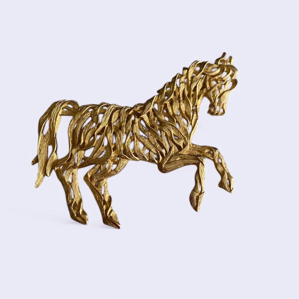 Elegant Gold Horse Sculpture